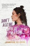 cover of don't ask me where i'm from - image of girl in front of a white brick wall