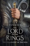 the-fellowship-of-the-ring-the-lord-of-the-rings-book-1-1 Lord of the Rings: The Fellowship of the Ring book cover, middle section of person in silver armor holding a gold hilted sword pointed down in their left hand.