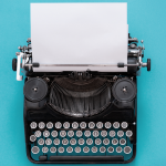 Typewriter with a blue background - Debut Novel icon